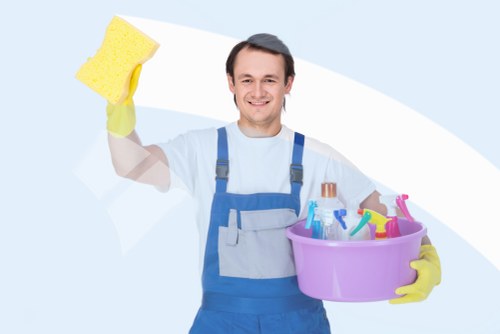 Deep cleaning equipment being used on a fabric armchair in Westkensington