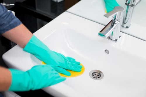 Local Airbnb turnover cleaner managing a Westkensington apartment handover